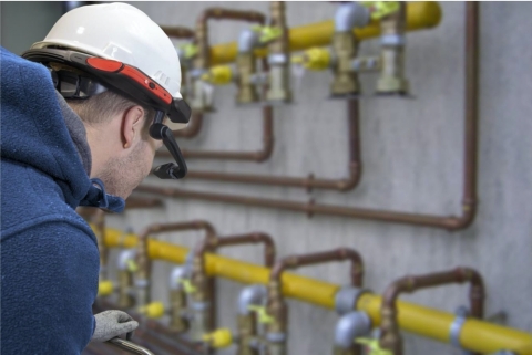Italgas workers experience digital transformation in restricted areas with RealWear's and OverIT's field services management hands-free solution. (Photo: Business Wire)