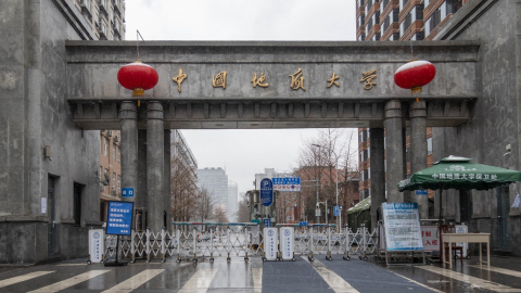 Closed school gate of China University of Geosciences, Beijing, China, February 14, 2020. /CGTN Photo by Qu Bo