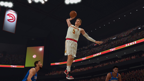 In-game NBA 2K20 screenshot of Make-A-Wish kid William Floyd dunking in an Atlanta Hawks jersey. (Photo: Business Wire)