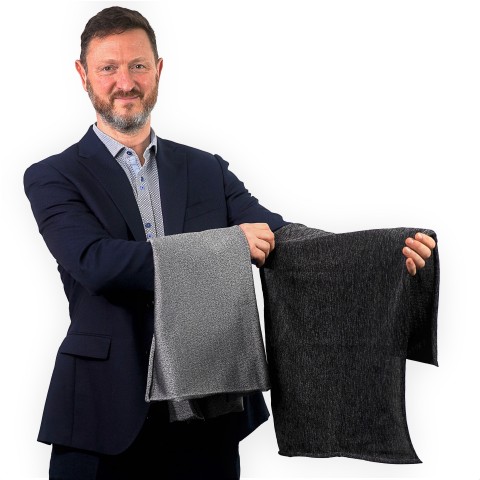 PPSS Group’s CEO showcasing first production sample of his firm’s black Cut-Tex PRO cut resistant fabric (Photo: Business Wire)