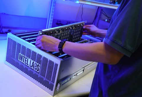 A photo shows Intel’s latest neuromorphic system, Pohoiki Springs, and one of the rows within it. The system unveiled in March 2020 integrates 768 Loihi neuromorphic research chips inside a chassis the size of five standard servers. (Credit: Intel Corporation)