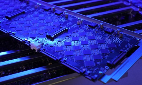 A closer look shows one of the rows within Intel’s latest neuromorphic research system, Pohoiki Springs. The system, unveiled in March 2020, is made up of eight of these rows, with each containing three 32-chip Intel Nahuku boards, for a total of 768 Loihi chips. The ninth row is made up of Arria10 FPGA boards. (Credit: Intel Corporation)