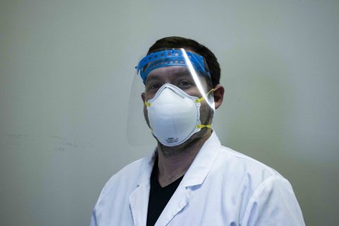 CTO David Walker models a HARP-generated medical face shield, which Azul 3D will start to mass-produce to help with the COVID crisis (Photo: Business Wire)