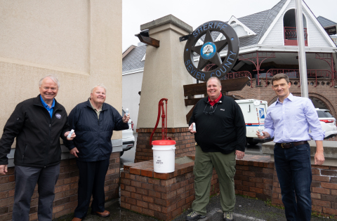Ole Smoky Distillery donated their first batch of hand sanitizer to the Sevier County Sheriff’s Department today. Pictured: Ole Smoky CEO Robert Hall, Sevier County Sheriff Ronald Seals, Chief Deputy Michael Hodges and Ole Smoky Founder, Joe Baker. (Photo: Business Wire)