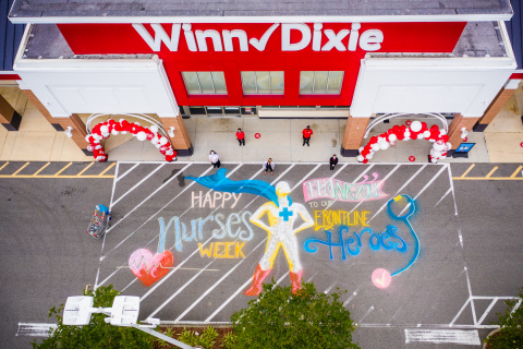 Winn-Dixie honors heroic nurses during National Nurses Week with chalk art and sweet treats. Photographed: Winn-Dixie store No. 7 in Jacksonville, Florida chalk art in partnership with local Ian & Danielle Cleary with Heartspace432. (Photo: Business Wire)