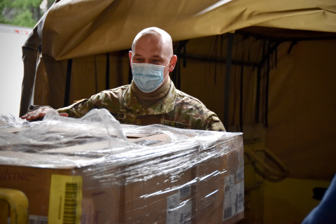 A Virginia National Guard guardsman helps load a shipment of 50,000 Hanes face masks to be distributed in Henrico County, Virginia, over the Memorial Day weekend (Photo: Business Wire)