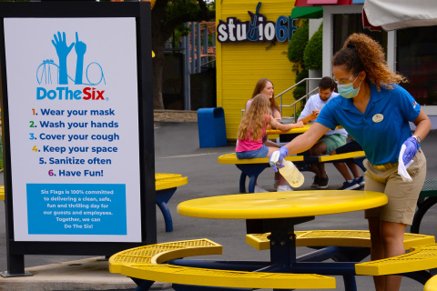 Six Flags clean teams will clean and disinfect high touch points including tabletops, counters, public seating, doors, and trash cans on a regular basis. (Photo: Business Wire)