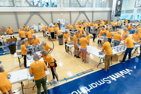 Vivint Smart Home volunteers serving with Feed My Starving Children. (Photo: Business Wire)