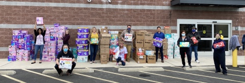 Members of the NWFCU Foundation and Volunteers with Diaper Drive Donations (Photo: Business Wire)