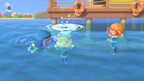 Grab a wet suit in Animal Crossing: New Horizons and get acquainted with your island marine life. Swim in the inviting waters off the coast of your island and dive to discover and scoop up sea creatures. (Photo: Business Wire)