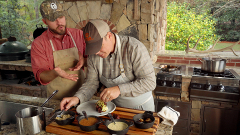 Chef Kevin Nashan puts the finishing touches on his perfect grilled ribeye. (Photo: Business Wire)