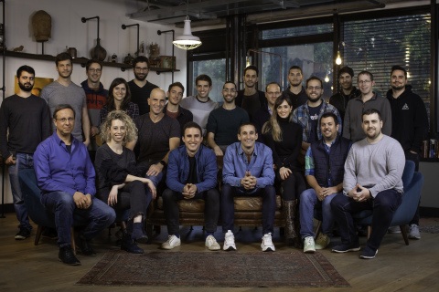 Hunters team. Co-founders Uri May, CEO (l.) and Tomer Kazaz, CTO (r.) seated in the front row center (Photo: Business Wire)