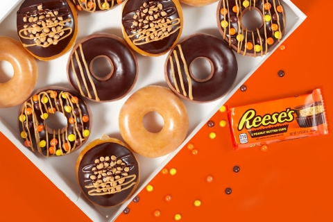 Starting July 24, fans can enjoy any of their three favorite Reese’s doughnuts at Krispy Kreme and share their greatest reviews to help determine the ‘Greataste Reese’s Doughnut of All Time’ (Photo: Business Wire)