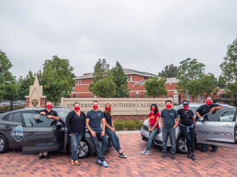 Representatives from MoceanLab and the USC Keck School of Medicine pose with two low-emission hybrid vehicles provided to USC’s Street Medicine Team to help serve L.A.’s unsheltered homeless population. (Photo: Business Wire)
