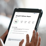 Sleep_Number_SleepIQ_Wellness_Report_iPad_in_hands.jpg