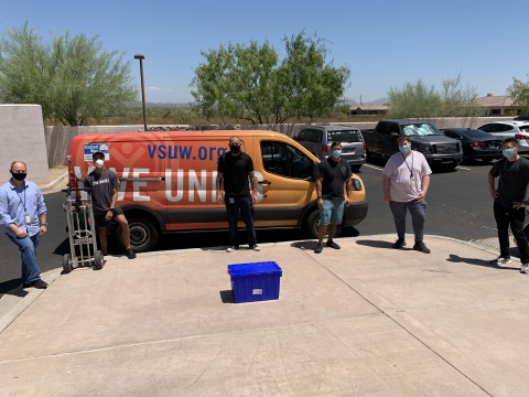 Employees of animal-health technology and services company Covetrus help load bottles of hand sanitizer created in the Company’s Phoenix-based pharmacy compounding facility into a Valley of the Sun United Way van. Covetrus’ hand sanitizer has been donated for use by nonprofit organizations and healthcare workers. (Photo: Business Wire)