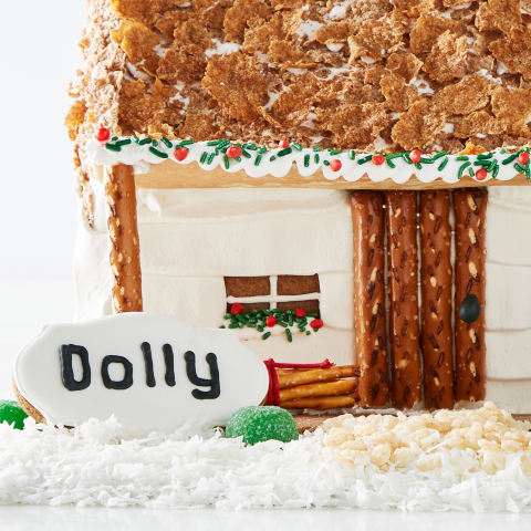 Dolly Parton Launches New Collaboration with Williams Sonoma Featuring a Gingerbread Log Cabin Replica of Her Childhood Home (Photo: Williams Sonoma)