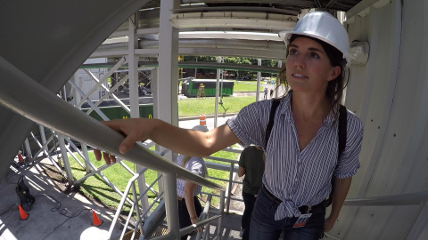 North Carolina State University student Mamie Trigg visits a HanesBrands biomass power generating plant in El Salvador that helps the company reduce carbon emissions. Trigg is featured in