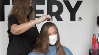 Hair Cuttery Stylist & Guest Emily Taylor at Aventura, Miami Curbside Cuts (Photo: Business Wire)