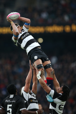 The Barbarians will suit up in their iconic black and white jerseys, now stamped with the MANSCAPED logo. (Photo: Business Wire)