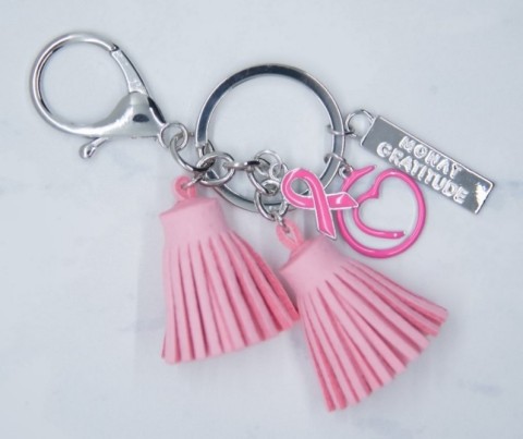 MONAT Gratitude Breast Cancer Awareness Pink Keychains are available for purchase throughout the month of October (Photo: Business Wire)