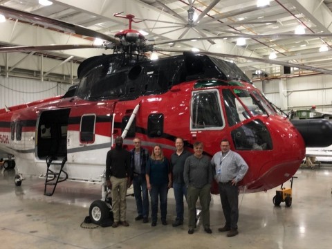 The Caliburn-CHS and CHI medical transport team, pictured from left to right: Kendz Toussaint, Caliburn Project Manager; Stew Boysen, CHI Chief Inspector: Karen Lentz, Caliburn Program Control Analyst; Jim Wilkerson, CHI Head Pilot; Joe DeLuca, Caliburn Medical Director; and Jim Russell, CHI Vice President (Photo: Business Wire)