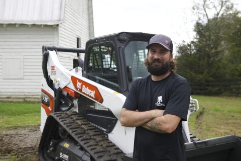 Doosan Bobcat North America, in partnership with Wounded Warrior Project® (WWP), presented U.S. Army veteran Andrew Long with a new Bobcat® R-Series T76 compact track loader and 80-inch bucket attachment. The two organizations teamed up at Piedmont Bobcat, the local Bobcat dealer near where Long lives in North Carolina, to personally deliver the machine to the veteran. (Photo: Business Wire)