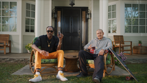 Vivint Guard Doggs—Snoop Dogg and Doggface chill on the front porch in new Vivint ad. (Photo: Business Wire)