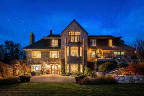 Headed to auction on November 30: Kingsdown Manor, a modern-European estate home in one of Canada's most exclusive communities near Calgary, Alberta. This private gem features stunning mountain views and close access to world-class outdoor activities. (Photo: Business Wire)