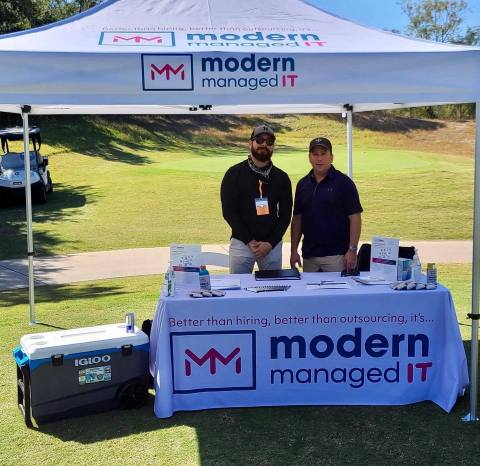 Alejandro Chavez (left), Business Development and Sean Wedige (right), CTO of Modern Managed IT at outdoor event in fall of 2020.  (Photo: Business Wire)