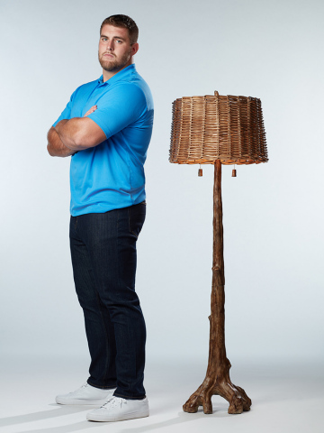 Los Angeles Chargers offensive lineman Forrest Lamp next to the Forrest lamp from Lamps Plus. Lamp's first signature lamp, the Forrest Sequoia floor lamp combines strength and power in a faux wood finish. The floor lamp blocks darkness from hindering room users. (Photo: Business Wire)