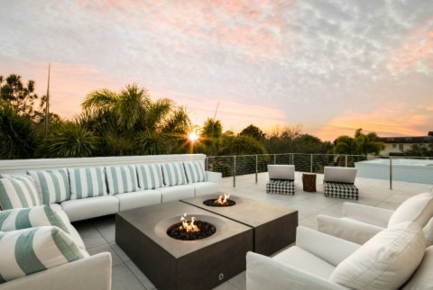 Kindred Fire Bowls feature a patent-pending brass burner system that uses half the fuel of conventional fire rings, yet produces higher flames and a brighter appearance. (Photo: Boral North America)