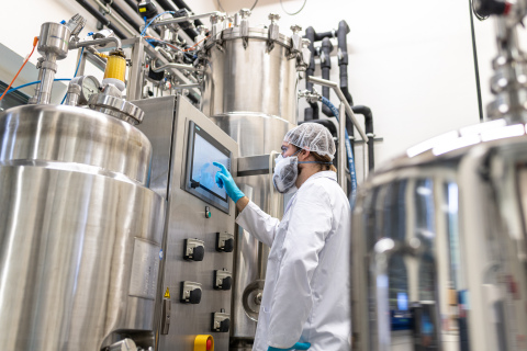 original An employee of c-LEcta operates a system for the production of enzymes. Through the strategic approach of a product company c-LEcta positions itself for future growth. Photo: c-LEcta / Eric-Kemnitz.com (Photo: Business Wire)