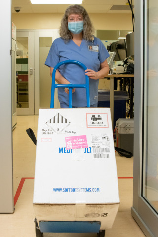 Michelle Vincent, Pharmacy Tech Lead, with the first doses of the COVID-19 vaccine delivered to Seattle Cancer Care Alliance. (Photo: Business Wire)