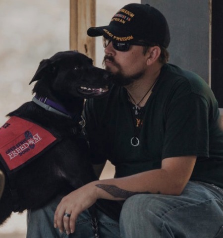 original U.S. Xpress partners with Warrior Freedom Service Dogs to help military veterans suffering from PTSD (Photo: Business Wire)