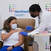 Arlene Ramirez, RN, get a shot of Moderna Vaccine from Michelle Chester, DNP, at Long Island Jewish Valley Stream. (Photo: Business Wire)