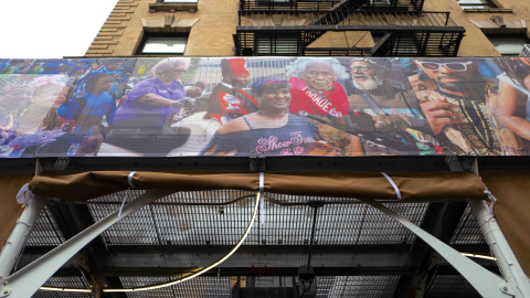 thumbnail Urban Umbrella’s structures display works by artists LeRone Wilson and Dianne Smith at Ruby’s Vintage and Harlem Chocolate Factory in Harlem’s historic Strivers’ Row (Photo: Business Wire)