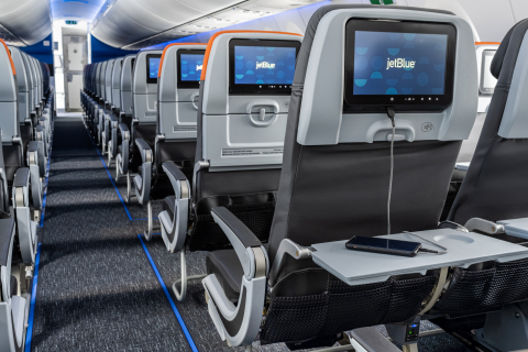 JetBlue's A220 aircraft features easy-to-reach in-seat power, featuring AC, USB-A, and USB-C ports at every seat. (Photo: Business Wire)