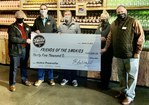 Ole Smoky Distillery has donated $35,000 to Friends of the Smokies. Pictured, left to right, Robert Hall , Ole Smoky Distillery, CEO, Cory Cottongim, Ole Smoky Distillery, President of Consumer Experience and Operations, Michael Simonis, Ole Smoky Distillery, Marketing Director, Lauren Gass, Friends of the Smokies, Senior Special Projects Director and Tim Chandler, Friends of the Smokies, Executive Director & CEO. (Photo: Business Wire)