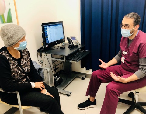 Mina Sedrak, M.D., M.S., a medical oncologist at City of Hope, speaks to breast cancer patient Yuyuan Lin on Dec. 31, 2020. (Photo credit: City of Hope)