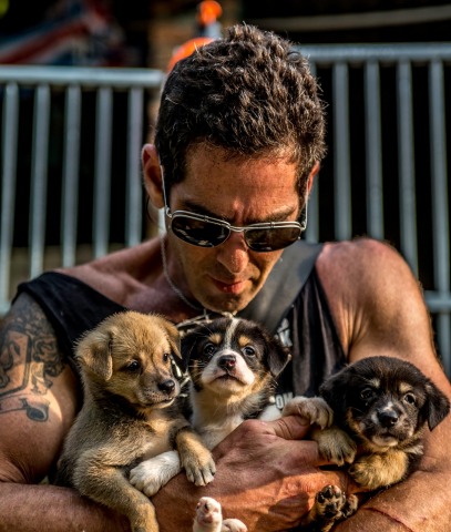 Jeffery Beri, founder of No Dogs Left Behind rescuing puppies from a slaughterhouse in China. (Photo: Business Wire)