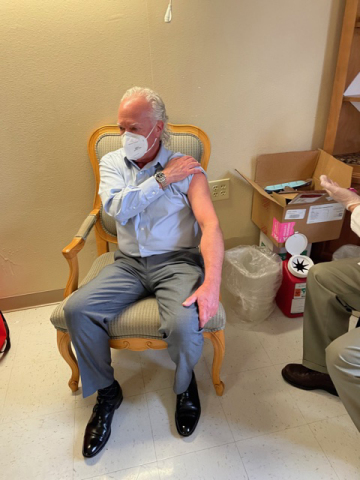 original The first in line to get his COVID vaccination for Priority Management at The Bradford! (Photo: Business Wire)