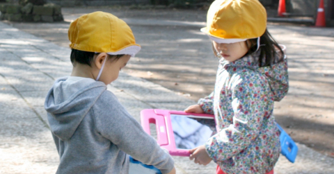 original MEES students using their iPads for outdoor lessons (Photo: Business Wire)