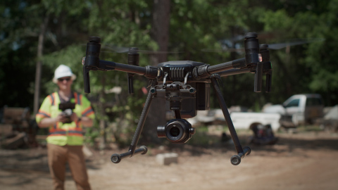 A PrecisionHawk drone pilot prepares to begin a site inspection. (Photo: Business Wire)
