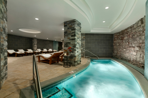 The Elms Hotel & Spa, A Destination Hotel offers guests a chance to unwind with a two-hour Grotto Spa pass including access to the sauna, hot tub, spa showers, and exfoliation bar for two plus in-room amenity. (Photo: Business Wire)