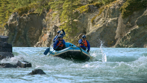 Team North America paddle through rapids on the Kananaskis River. (Credit: National Geographic)