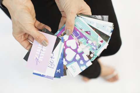Kindli Cards, printed by RRD, are Kindli’s proprietary, patent-pending method of tracking kind acts all around the world. (Photo: Business Wire)