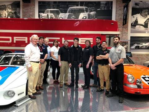 Pictured from left: Dano Davis, and his team at the Brumos Collection with Brian Martin, director of Automotive Restoration Projects at McPherson College; and students Daniel Journey, Tim Lauring, Kevin Boeckman, Gerardo Menez, Jr.; and Aaron Israel, 2018 graduate of McPherson College and assistant manager at the Brumos Collection. (Photo: McPherson College)