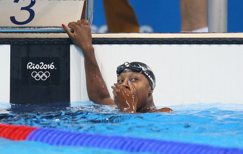 Simone+Manuel+channels+her+winning+team+and+clears+first+in+the+50+to+claim+the+individual+Olympic+race