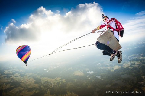 Austrian photographer Philip Platzer gets the perfect in-air shot of Red Bull Skydive teammate, Marco Fürst, participating in The Megaswing Project. (Photo: Philip Platzer/ Red Bull Illume)